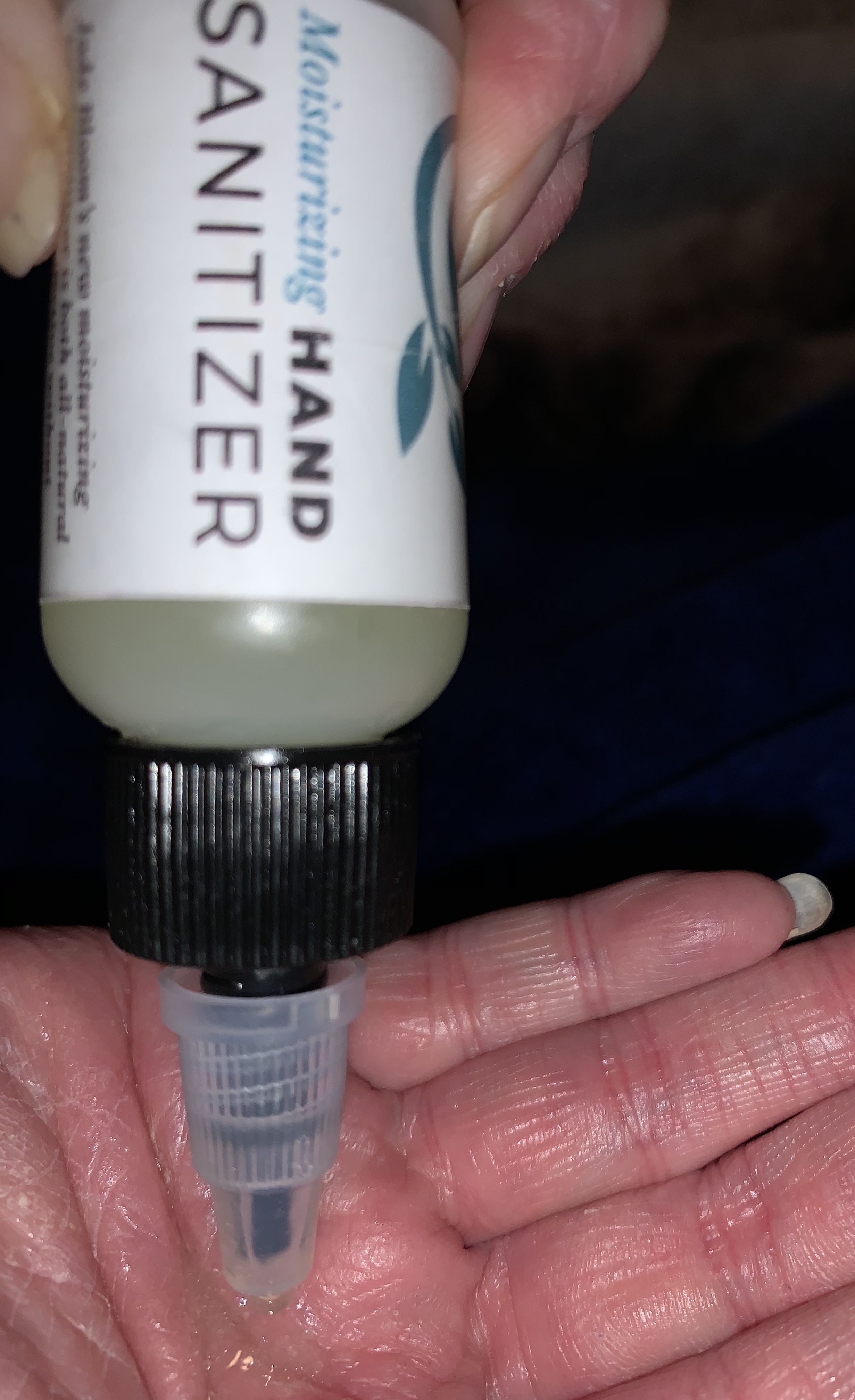 A real photo of Hand Sanitizer & Moisturizer  by A MUST HAVE  (2)